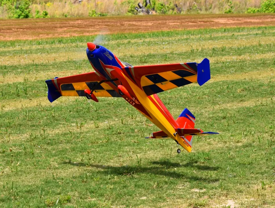 48" Extra 300 EXP V2 – Rot/Blau/Gelb 1,21 m von Extreme Flight – Modellflugzentrum Schweiz